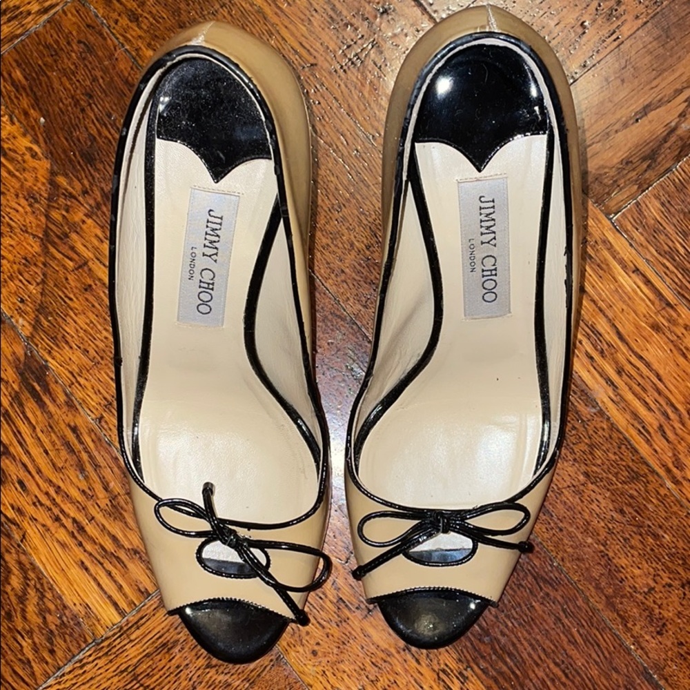 Jimmy Choo Black and Tan pumps